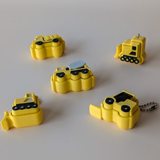 Construction vehicle fidget clickers β pocket-sized sensory toys in clicky or silent switch