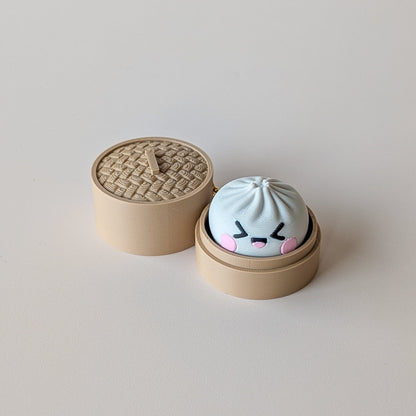 Close-up of Dumpling Clicker showing mystery face detail — sensory fidget toy by Elevated Expressions