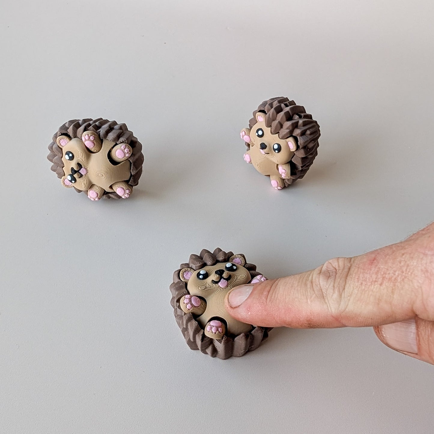 Hedgehog Clicker fidget toy with moving arms and sweet face — sensory clicker by Elevated Expressions