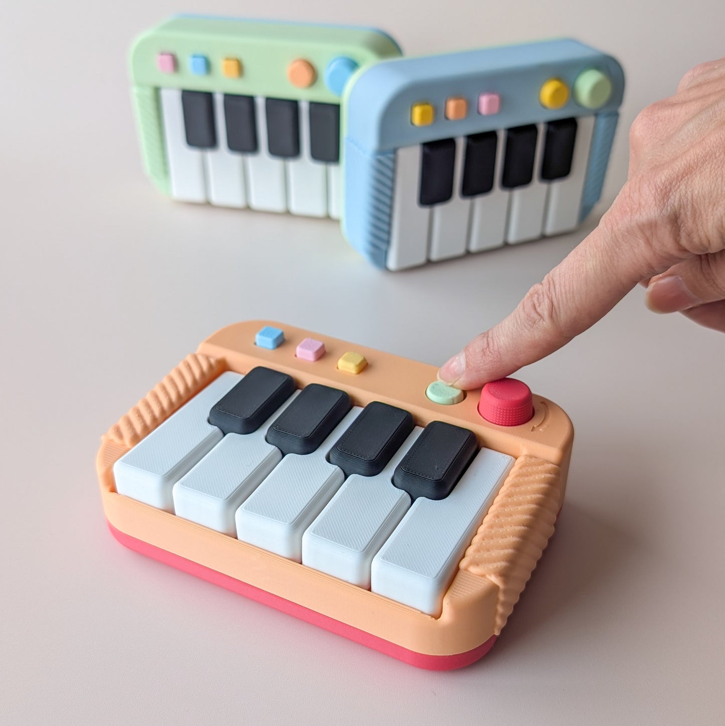 Piano Clicker – 3D printed palm-sized piano sensory fidget toy, handmade in Geelong by Elevated Expressions