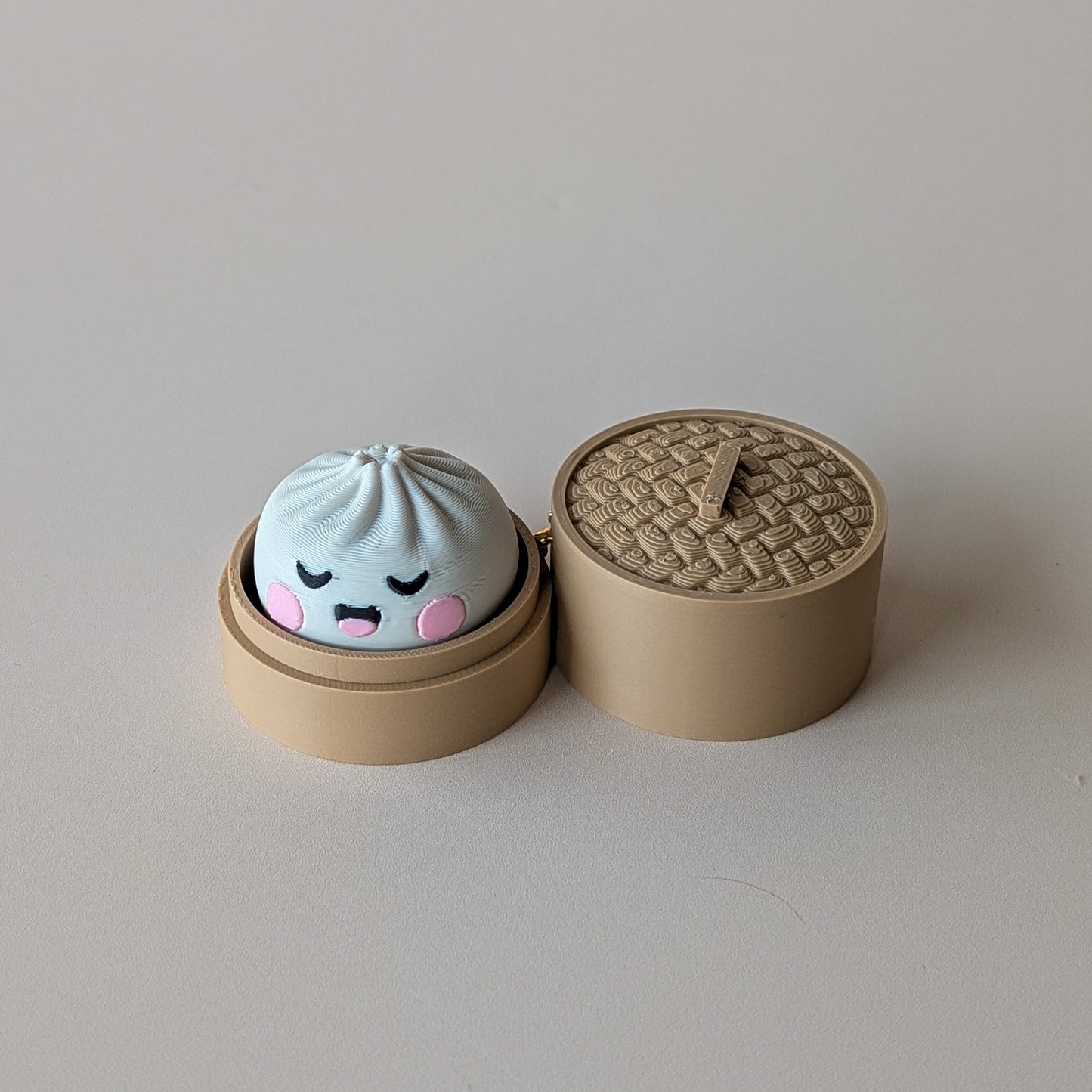 Dumpling Clicker sensory fidget toy with mystery face — cute clicker made in Geelong by Elevated Expressions